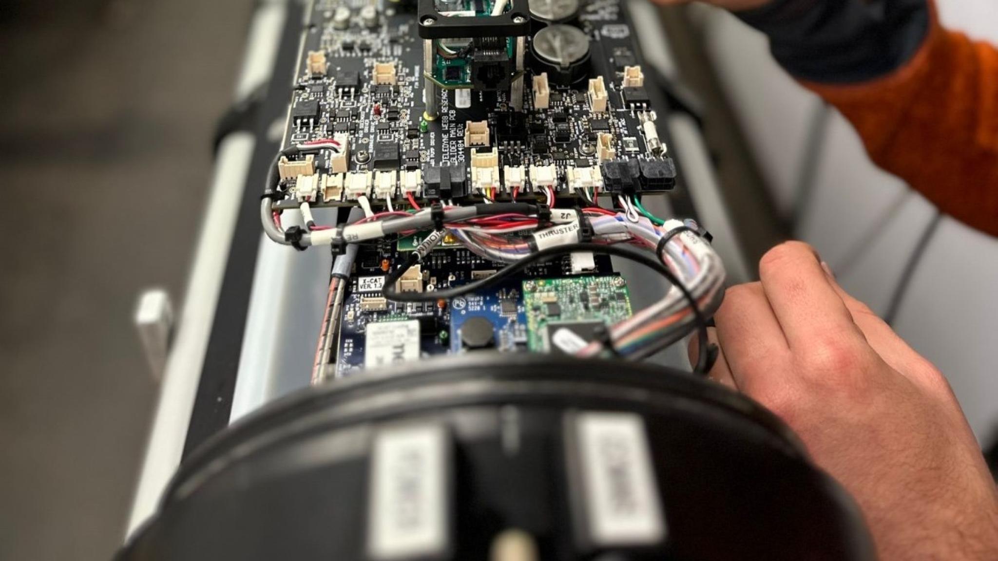 the inside of a glider, showing electronics and printed circuit board