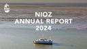 Cover of the NIOZ Annual Report 2024 showing the ship RV Wim Wolff sailing the Wadden Sea
