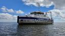 RV Wim Wolff almost falling dry on mudflat 'de Driesprong' during the SIBES sampling expedition in the summer of 2024 (photo: Dennis Mosk)