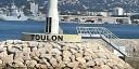 The post marking the entrance to Toulon harbour.