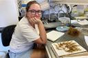 Dr. Juliane Bernardi Vasconcelos prepares Sargassum fronds for herbarium deposits. (Photo credit: Erik Zettler).