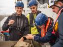 Close up of students investigating the sediment sample from the box core (© Maxi Scheller). 