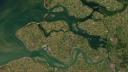 Satellietbeeld van Zeeland met de Oosterschelde en Westerschelde, waar helder water de noodzaak voor meer troebelheid toont voor kustbescherming. Credit: basemaps, Esri, Maxar, Earthstar Geographics, and the GIS User Community